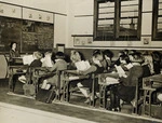 Children and teacher inside a classroom at Newtown School, Wellington