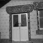 Carved wooden door surround at Tu Kaki meeting house, Te Kaha