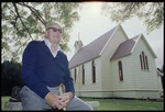 George Hooper outside the restored Christ Church, Taita, Lower Hutt