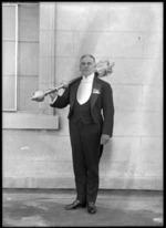 Sergeant-at-Arms Major T V Shepherd with the mace, Parliament Buildings, Wellington