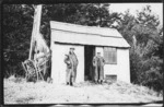 John Cullen and Sir James Gunson outside the haunted whare at Tongariro National Park