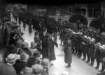 Miss Fergusson inspects girl guides and brownies