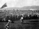 Te Arawa warriors performing a haka at Rotorua during the 1901 visit of the Duke and Duchess of Cornwall and York