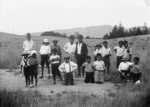 Three-legged race participants at Poukawa