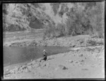 Lydia Williams on the river bank below the Whakapapa and Whanganui Rivers confluence near the settlement of Kakahi, Manawatu-Whanganui Region