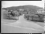 Main entrance and gardens of home, probably of Mr B Sutherland, Homewood, Karori, Wellington