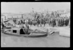 Funeral procession with the coffin being carried to a gondola, Venice, Italy