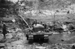 Rowe, E K S, fl 1941 (Photographer) : World War 2 soldiers of 19 NZ A Tps Company using a tractor to construct a road on Olympus Pass, Greece