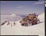 Tourists riding a snowcat and skiing, Mount Ruapehu