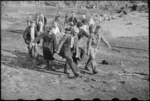 Rescuers carrying away the body of a victim of the Tangiwai rail disaster