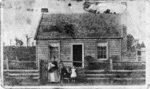 Kelly family outside a house in Invercargill