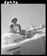 Child patient and matron, at the Wilson Home for crippled children in Takapuna, Auckland