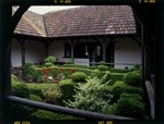 View of the house and garden at `Woodleigh Farm,' near Marton, Rangitikei District, Manawatu-Wanganui Region