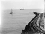 North Mole with railway line, at Castlecliff, Wanganui, and ships