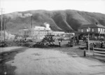 Men working on the railway outside the Grand National Hotel, Petone