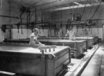 Men making cheese at the Kaupokonui Dairy Company factory in Taranaki
