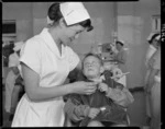 Dental nurse with a patient at the Children's Dental Clinic, Wellington - Photograph taken by Edward Percival Christensen