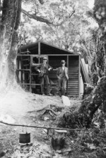 Waiopehu Hut under construction, with E S Lancaster, and another