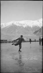 Man ice skating on Lake Tekapo