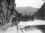 A view of Buller Gorge showing 3 men and a woman