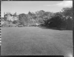 House and tennis court across large lawn, Homewood, Karori, Wellington