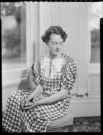 Jean Sutherland seated inside at Homewood, Karori, Wellington