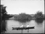 William and Lydia Williams in a canoe on Tutaekuri River, Hawke's Bay