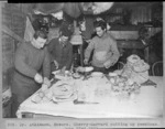Henry Robertson Bowers, Edward L. Atkinson and Apsley George Benet Cherry-Garrard cutting up pemmican, Antarctica