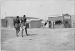 Scene at the World War 1 military camp at Zeitoun, Egypt, showing soldiers, a drug store and a book stall