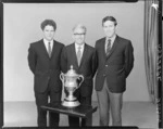 Unidentified group of three men with the Chatham Cup soccer trophy, May 1972 [Jeffery?]