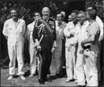 Governor General Sir Arthur Porritt laughing with a group of painters at Government House - Photograph taken by Morris James Hill