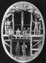 Men standing at the entrance to a tunnel under construction on the Midland Railway Line (Canterbury Region)