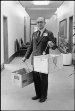 Parliamentary messenger Mr Robert Smith, with cardboard boxes used for deliveries - Photograph taken by Gail Selkirk