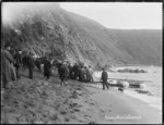 Men clearing the beach at Cape Terawhiti, Wellington, after the ship Penguin was wrecked