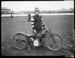 W M Smith, speedway rider, on Douglas motorcycle, at Kilbirnie stadium, Wellington