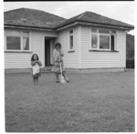 Young Maori girls outside a house in Ruatoki; and scenes at a Maori youth club meeting in Whakatane