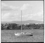 Views of a yacht and planes, Evans Bay, Wellington; and orator and spectators in Albert Park, Auckland
