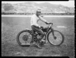 Speedway rider Alec Pratt, on Norton motorcycle, at Kilbirnie stadium, Wellington