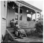Man and woman at their home on River Road, Hamilton, 1971