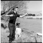 Father teaching his son fly-casting on the Heathcote River at Woolston, 1971.