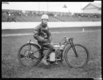 J Richards, speedway rider, on Douglas motorcycle, at Kilbirnie stadium, Wellington