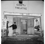 Scenes outside the Gaiety Theatre, and men working on a hangi pit, all at Te Kaha