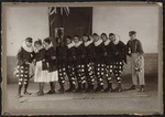Group portrait of theatre performers in costume