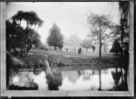 Supreme Court buildings seen across the Avon River in Christchurch