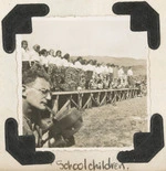 Schoolgirls holding wreaths - Photograph taken by Owen Johnson