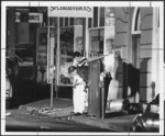 Police examine bomb damage in Vivian street - Photograph taken by John Nicholson