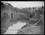 Men working on western approach to Carillon and Dominion Museum, Mt Cook, Wellington