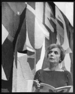 Portrait of Louise Henderson in front of the New Zealand Room tapestry, Wellington