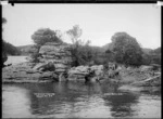 Tokatoka Rocks at Tokatoka Point, Raglan Harbour, 1910 - Photograph taken by Gilmour Brothers