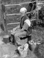 Elderly man scraping a chunk of gum